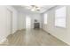 Spacious bedroom with hardwood floors and large windows at 907 S East St, Indianapolis, IN 46225