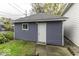 Detached garage with single door and window at 907 S East St, Indianapolis, IN 46225