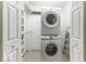 Laundry closet with stackable washer and dryer at 907 S East St, Indianapolis, IN 46225