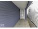 Side entrance with a covered walkway leading to the front door at 907 S East St, Indianapolis, IN 46225
