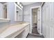 Clean bathroom with a vanity, mirror and a toilet at 4715 Stansbury Ln, Indianapolis, IN 46254