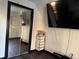 Bedroom with mirrored closet and TV at 803 E 21St St, Anderson, IN 46016