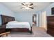 Spacious bedroom with a king-size bed and ceiling fan at 15134 Clear St, Noblesville, IN 46060