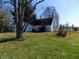 House with detached garage and spacious backyard at 3022 N Alaska Rd, Cloverdale, IN 46120