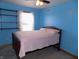 Bedroom with a double bed and built-in shelving at 3022 N Alaska Rd, Cloverdale, IN 46120