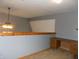 Cozy loft area with a desk and built-in shelving at 3022 N Alaska Rd, Cloverdale, IN 46120