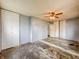 Bedroom with ceiling fan and double closets at 3465 W Murray St, Indianapolis, IN 46221