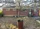 Brick house backyard with a large tree at 4025 N Campbell Ave, Indianapolis, IN 46226