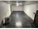 Unfinished basement with tiled floor and white block walls at 4025 N Campbell Ave, Indianapolis, IN 46226