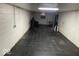 Unfinished basement with tiled floor and white block walls at 4025 N Campbell Ave, Indianapolis, IN 46226