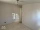 Empty bedroom with light-colored walls and carpeted floor at 4025 N Campbell Ave, Indianapolis, IN 46226
