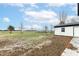 Large backyard with a detached garage and open space at 6015 S State Road 75, Coatesville, IN 46121