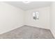 Spacious bedroom with neutral walls and carpet at 6015 S State Road 75, Coatesville, IN 46121