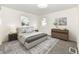 Modern bedroom with a plush bed and stylish dresser at 6015 S State Road 75, Coatesville, IN 46121