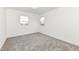 Well-lit bedroom with neutral walls and carpet at 6015 S State Road 75, Coatesville, IN 46121