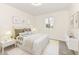 Charming bedroom featuring a staged bed and décor at 6015 S State Road 75, Coatesville, IN 46121