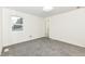 Bright bedroom with neutral carpet and a window at 6015 S State Road 75, Coatesville, IN 46121