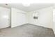 Well-lit bedroom with grey carpet and closet at 6015 S State Road 75, Coatesville, IN 46121