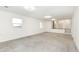 Bright living room featuring neutral walls and tile floors at 6015 S State Road 75, Coatesville, IN 46121