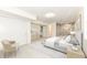 Main bedroom with large bed, walk-in closet and marble shower at 6015 S State Road 75, Coatesville, IN 46121