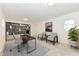 Home office with built-in shelving and comfortable seating at 6015 S State Road 75, Coatesville, IN 46121