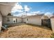 Backyard view showing patio, detached garage, and fenced area at 2666 Lafayette Ave, Columbus, IN 47201