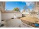 Fenced backyard with patio and detached garage at 2666 Lafayette Ave, Columbus, IN 47201