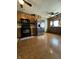 Spacious kitchen featuring wood cabinets, stainless steel appliances, and wood-look flooring at 315 E Hanna Ave, Indianapolis, IN 46227