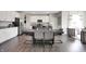 Spacious dining area with dark wood table and gray chairs at 700 Bedford Dr, Danville, IN 46122