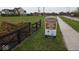 Community sign displays information about custom home sites at 8030 Totton Ct, Zionsville, IN 46077