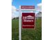 Diyanni Homes real estate sign with contact information at 8030 Totton Ct, Zionsville, IN 46077
