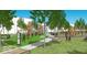 Community playground with play structures and picnic tables at 9344 Anthem Ave, Plainfield, IN 46168