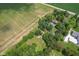 Aerial view showing house, pool, and expansive property at 10645 N State Road 9, Fountaintown, IN 46130