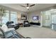 Spacious living room with leather furniture and TV at 15760 Barnard Dr, Noblesville, IN 46062