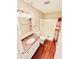 Bathroom with shower/tub combo, vanity, and wood-look flooring at 1632 Wellesley Ct # 6, Indianapolis, IN 46219