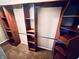 Walk-in closet with shelving and hanging rods at 1632 Wellesley Ct # 6, Indianapolis, IN 46219