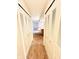 Hallway with carpet and double closets at 1632 Wellesley Ct # 6, Indianapolis, IN 46219