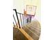 Carpeted staircase with ornate railing leading to upper levels at 1632 Wellesley Ct # 6, Indianapolis, IN 46219
