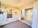 Bright sunroom with sliding glass doors and decorative accents at 1632 Wellesley Ct # 6, Indianapolis, IN 46219