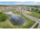 Community overview featuring a pond and homes at 235 Hunters Ridge Dr, Danville, IN 46122