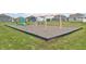 playground with swings and slides at 235 Hunters Ridge Dr, Danville, IN 46122