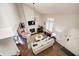 Bright living room showcases hardwood floors, a fireplace, and a high ceiling at 463 E Arch St, Indianapolis, IN 46202