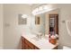 Well-lit bathroom featuring a vanity and large mirror at 7945 Meadow Bend Dr, Indianapolis, IN 46259