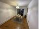 Simple dining room with hardwood floors and sliding doors at 8343 Mills Rd, Indianapolis, IN 46241