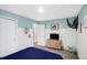 Bedroom with coastal decor, featuring a blue bed, and built in shelving at 9138 Blunt Ave, Indianapolis, IN 46239