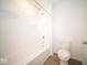 Bathroom featuring a shower/tub combo and a toilet at 9225 Kavanaugh Dr, Indianapolis, IN 46239