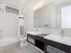 Bathroom with double vanity, white subway tile, and a shower/tub combo at 1213 Cottage Ave, Indianapolis, IN 46203