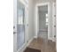 Bright entryway with wood floors and access to other rooms of the home at 1213 Cottage Ave, Indianapolis, IN 46203
