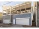 Home features a detached garage with additional upper level at 1213 Cottage Ave, Indianapolis, IN 46203