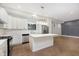 Modern kitchen with white cabinets, stainless steel appliances and an island at 1213 Cottage Ave, Indianapolis, IN 46203